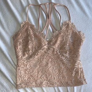 Crop top tank, light pink flowery stitching.